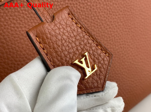 Louis Vuitton Lock It MM Bag in Gold Taurillon Leather and Smooth Leather M22925 Replica