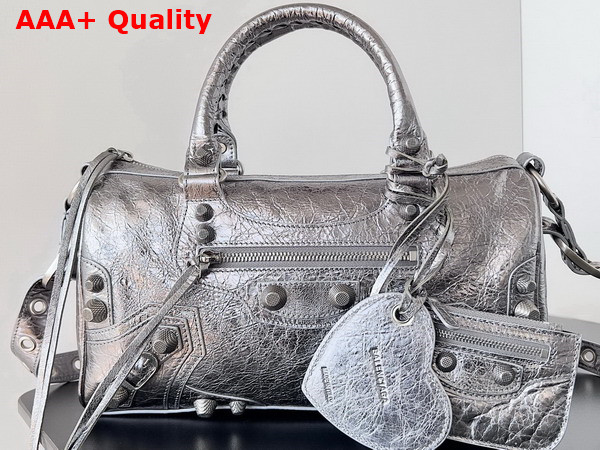 Balenciaga Le Cagole Medium Duffle Bag in Silver Metallized Arena Lambskin Replica