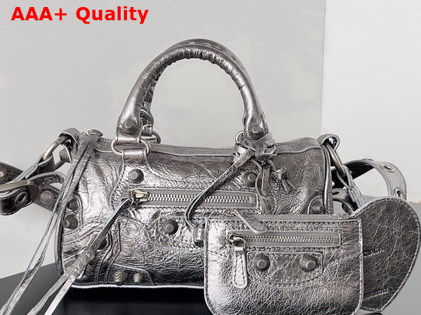 Balenciaga Le Cagole Mini Duffle Bag in Silver Metallized Arena Lambskin Replica