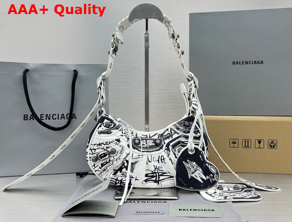 Balenciaga Le Cagole XS Shoulder Bag in White and Black Graffiti Printed Arena Lambskin Aged Silver Hardware Replica