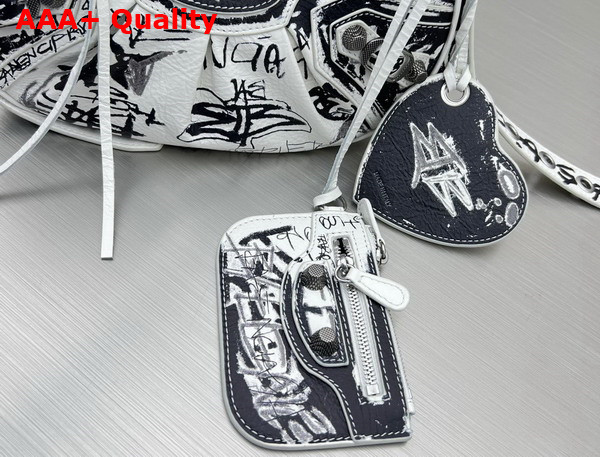 Balenciaga Le Cagole XS Shoulder Bag in White and Black Graffiti Printed Arena Lambskin Aged Silver Hardware Replica