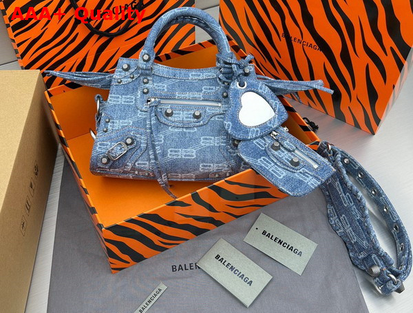 Balenciaga Neo Cagole XS Shoulder Bag in Blue BB Monogram Bleached Denim Aged Silver Hardware Replica