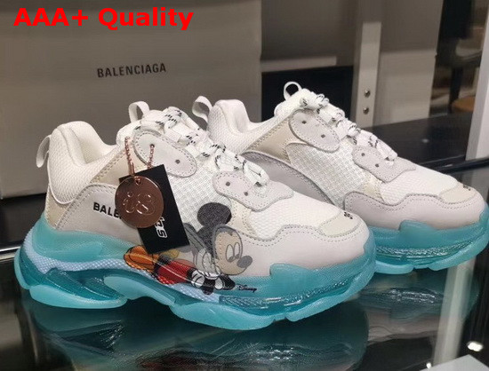 Balenciaga Triple S Clear Sole Sneaker in White and Light Grey Calfskin Lambskin and Mesh Light Blue Sole Printed Mickey Mouse Replica