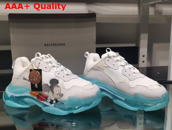 Balenciaga Triple S Clear Sole Sneaker in White and Light Grey Calfskin Lambskin and Mesh Light Blue Sole Printed Mickey Mouse Replica