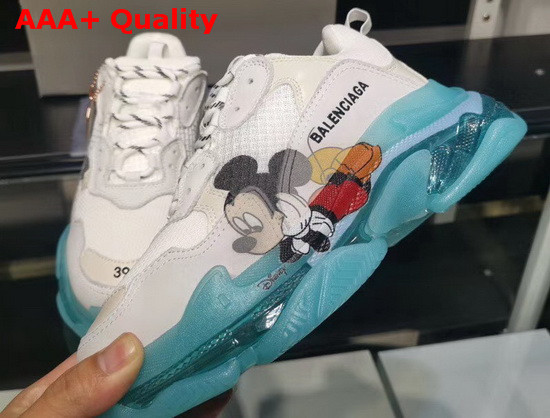 Balenciaga Triple S Clear Sole Sneaker in White and Light Grey Calfskin Lambskin and Mesh Light Blue Sole Printed Mickey Mouse Replica