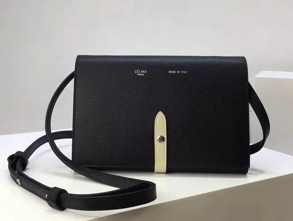 Celine Strap Clutch in Black Grained and Chalk Shiny Calfskin For Sale