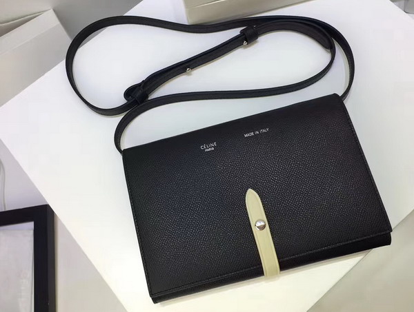 Celine Strap Clutch in Black Grained and Chalk Shiny Calfskin For Sale