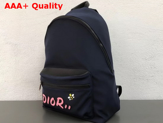 Dior X Kaws Rider Backpack in Navy Blue Nylon with Pink Dior Logo Replica