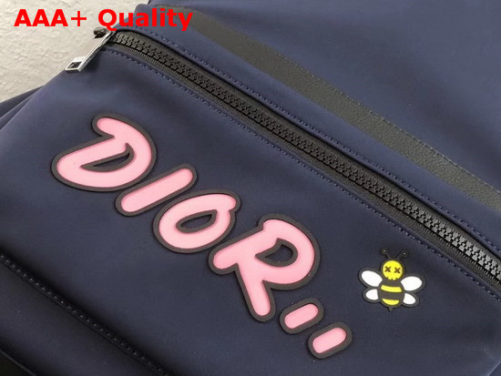 Dior X Kaws Rider Backpack in Navy Blue Nylon with Pink Dior Logo Replica