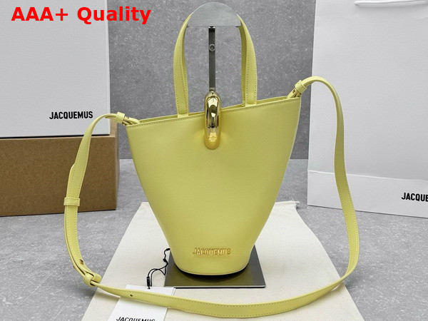 Jacquemus The Small Bambola Asymmetric Mini Bucket Bag in Light Yellow Smooth Leather Replica