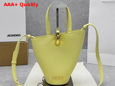 Jacquemus The Small Bambola Asymmetric Mini Bucket Bag in Light Yellow Smooth Leather Replica