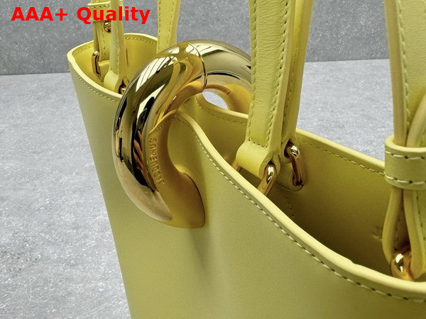 Jacquemus The Small Bambola Asymmetric Mini Bucket Bag in Light Yellow Smooth Leather Replica