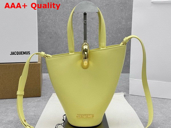 Jacquemus The Small Bambola Asymmetric Mini Bucket Bag in Light Yellow Smooth Leather Replica