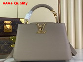 Louis Vuitton Capucines BB Handbag in Galet Gray Taurillon Leather with Golden Monogram Blossom in Metal Replica