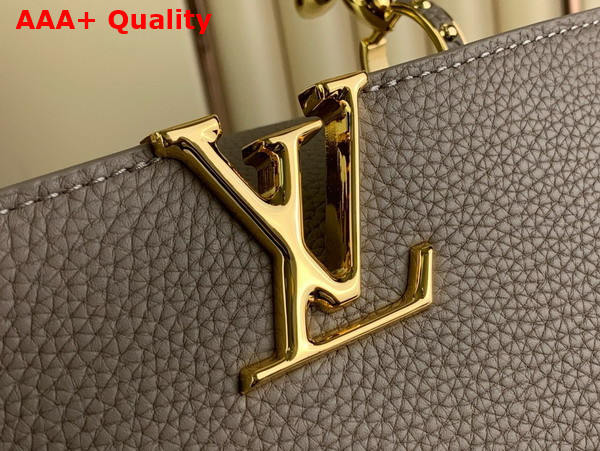 Louis Vuitton Capucines BB Handbag in Galet Gray Taurillon Leather with Golden Monogram Blossom in Metal Replica