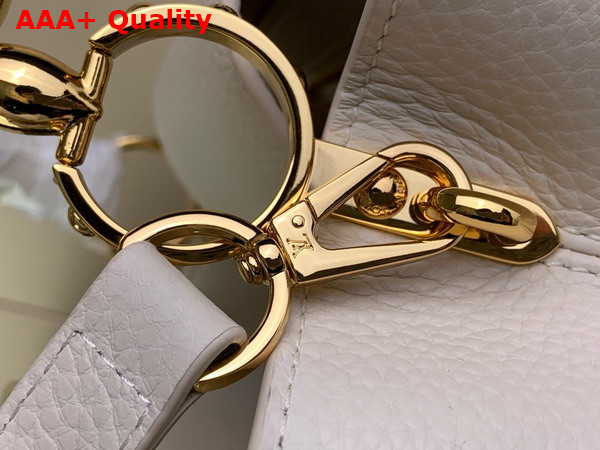 Louis Vuitton Capucines BB Handbag in Snow White Taurillon Leather with Golden Monogram Blossom in Metal Replica