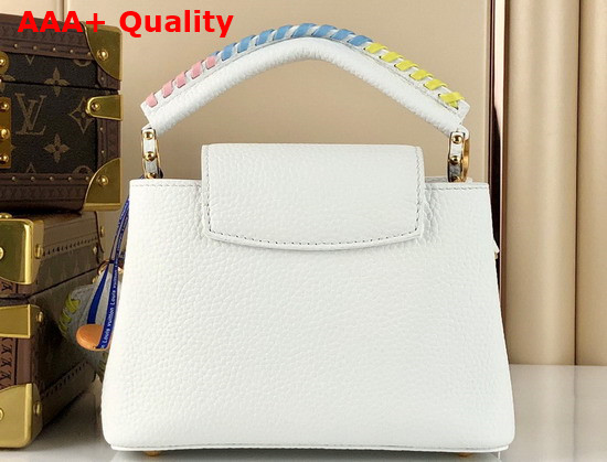 Louis Vuitton Capucines Mini Handbag Snow Taurillon Leather and Features Rich Braided Details Replica