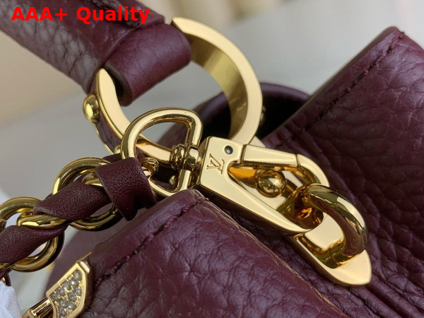 Louis Vuitton Capucines Mini Handbag in Burgundy Taurillon Leather with Gold Color Monogram Flowers Replica