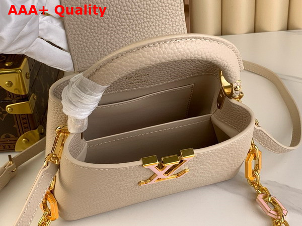 Louis Vuitton Capucines Mini Handbag in Quartz White Taurillon Leather The Links are Decorated with Jewel Like Enamel Replica