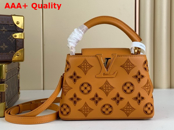 Louis Vuitton Capucines Mini Handbag in Saffron Yellow Calfskin Perforated with the Monogram Pattern M22863 Replica