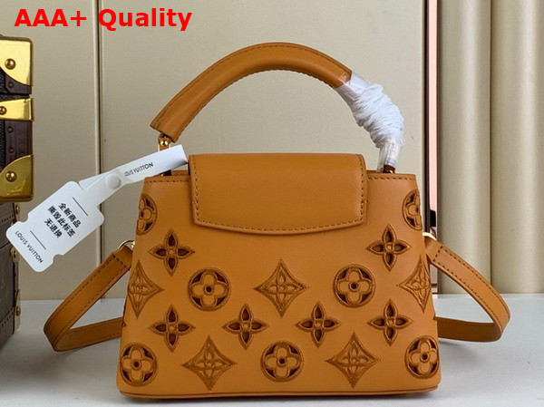 Louis Vuitton Capucines Mini Handbag in Saffron Yellow Calfskin Perforated with the Monogram Pattern M22863 Replica