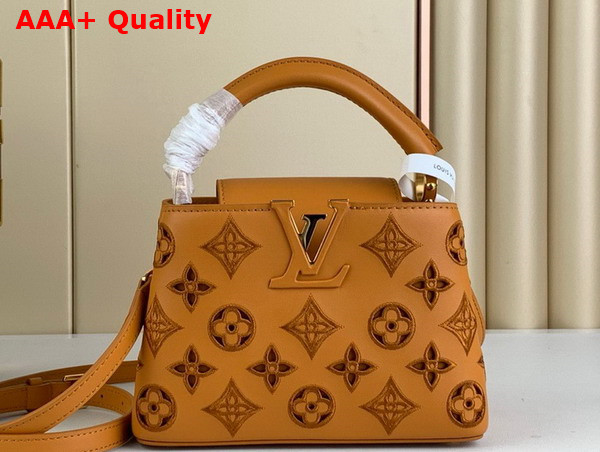 Louis Vuitton Capucines Mini Handbag in Saffron Yellow Calfskin Perforated with the Monogram Pattern M22863 Replica