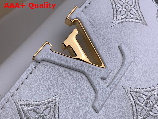 Louis Vuitton Capucines Mini Handbag in Snow White Calfskin Perforated with the Monogram Pattern Replica