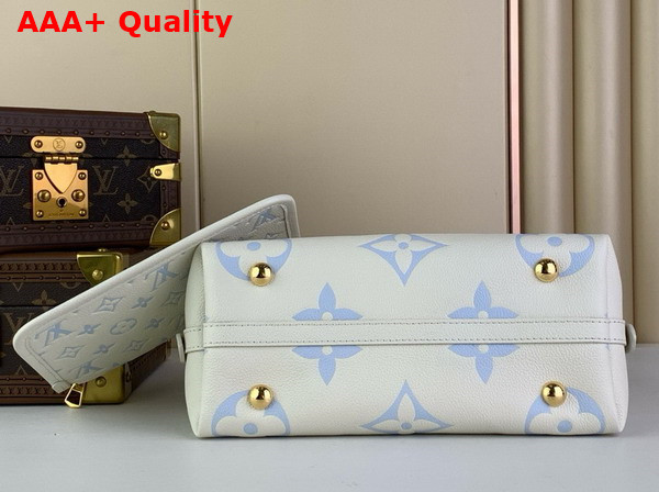 Louis Vuitton Carryall PM Bag Latte Candy Blue Bicolor Monogram Empreinte Leather Replica