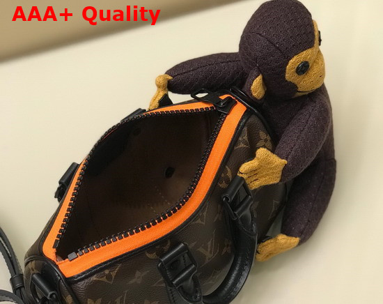 Louis Vuitton Keepall XS Bag Accessorized with a Knit Puppet M80118 Replica