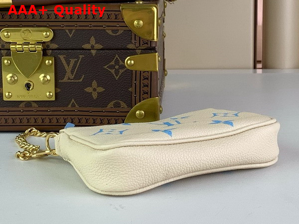 Louis Vuitton Mini Pochette Accessoires Beige and Blue Monogram Empreinte Leather Replica