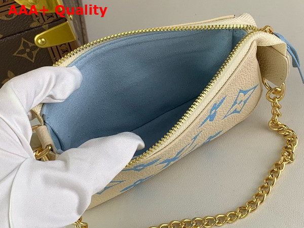 Louis Vuitton Mini Pochette Accessoires Beige and Blue Monogram Empreinte Leather Replica