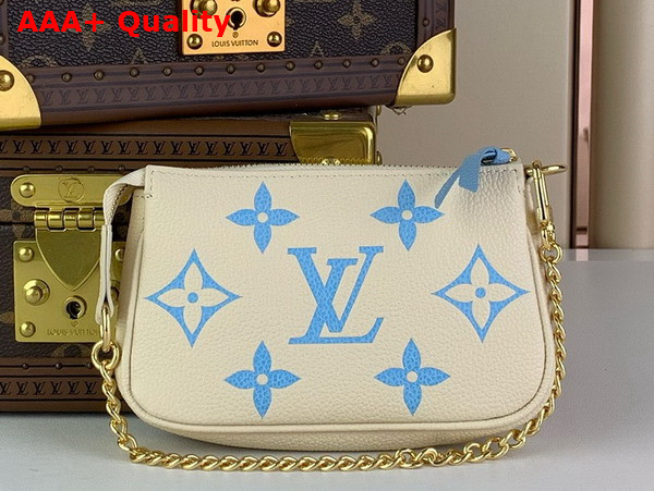 Louis Vuitton Mini Pochette Accessoires Beige and Blue Monogram Empreinte Leather Replica