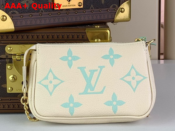 Louis Vuitton Mini Pochette Accessoires Beige and Turquoise Monogram Empreinte Leather Replica