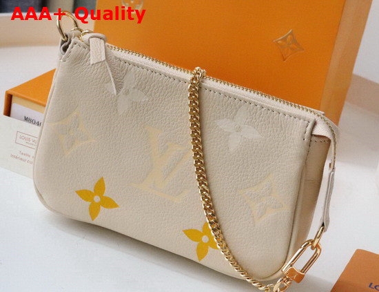 Louis Vuitton Mini Pochette Accessoires Cream Saffron Monogram Empreinte Leather Gradation on the Embossed Monogram Pattern M80501 Replica