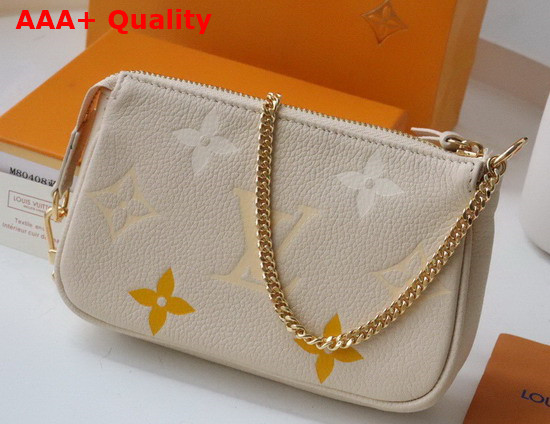 Louis Vuitton Mini Pochette Accessoires Cream Saffron Monogram Empreinte Leather Gradation on the Embossed Monogram Pattern M80501 Replica