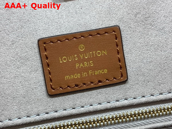 Louis Vuitton Onthego MM Tote Metallic Silver Coated Canvas and a Subtle Monogram Motif in the Background M21233 Replica