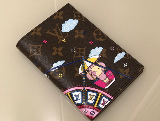 Louis Vuitton Passport Cover in Monogram Canvas Decorated with an Illustration of Louis Vuittons Vivienne Mascot Riding the Big Wheel at a Funfair M69746 Replica