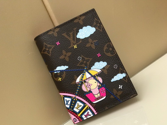 Louis Vuitton Passport Cover in Monogram Canvas Decorated with an Illustration of Louis Vuittons Vivienne Mascot Riding the Big Wheel at a Funfair M69746 Replica