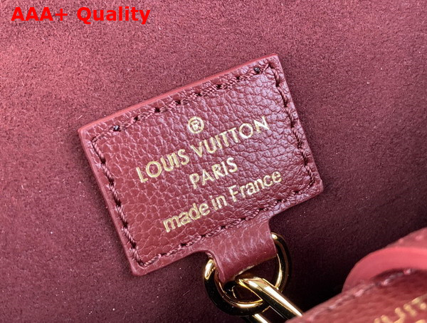 Louis Vuitton Sac Sport Bag in Burgundy Monogram Empreinte Leather Replica