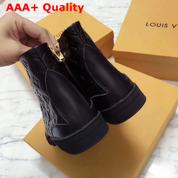 Louis Vuitton Stellar Sneaker Boot in Black Monogram Embossed Calf Leather Features a Side Zip for Easy Fitting 1A2XPK Replica