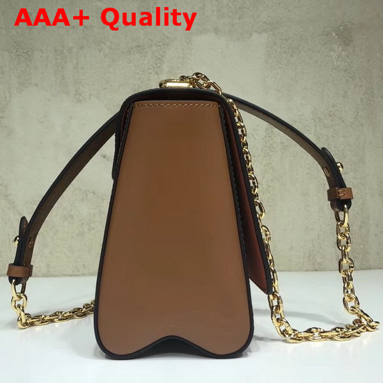 Louis Vuitton Twist MM Brown and Orange Transformed Monogram Canvas Aged Natural Cowhide Trim M44408 Replica