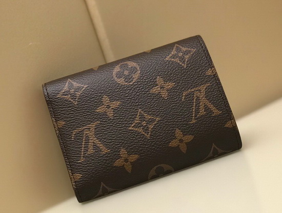 Louis Vuitton Victorine Wallet in Monogram Canvas Features a Colorful Illustration of Louis Vuittons Vivienne Mascot Riding a Roller Coaster M69751 Replica