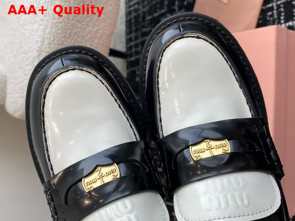 Miu Miu Brushed Leather Loafers in Black and White 5D276E Replica