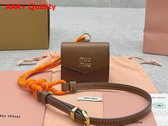 Miu Miu Leather Cord and Metal Trick with Mini Pouch Cognac and Orange 5TL515 Replica