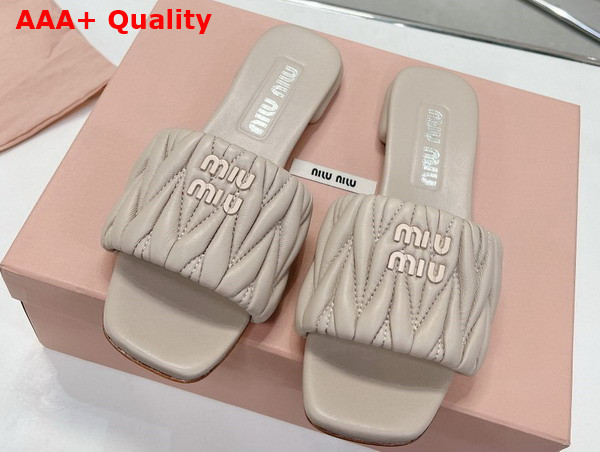 Miu Miu Matelasse Nappa Leather Slides in Beige 5XX605 Replica