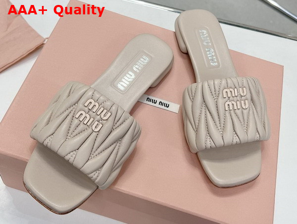 Miu Miu Matelasse Nappa Leather Slides in Beige 5XX605 Replica