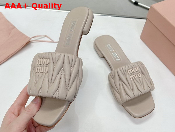 Miu Miu Matelasse Nappa Leather Slides in Beige 5XX605 Replica