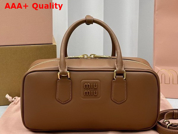 Miu Miu Medium Leather Top Handle Bag in Cognac 5BB148 Replica