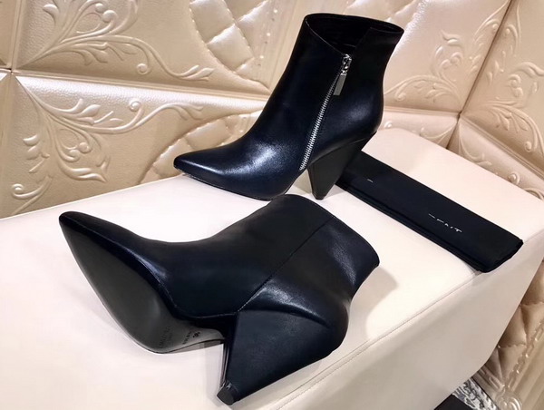 Saint Laurent Niki 105 Asymmetrical Ankle Boot in Black Leather with Structural Cone Heel For Sale