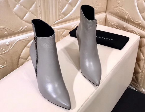 Saint Laurent Niki 105 Asymmetrical Ankle Boot in Silver Leather with Structural Cone Heel For Sale